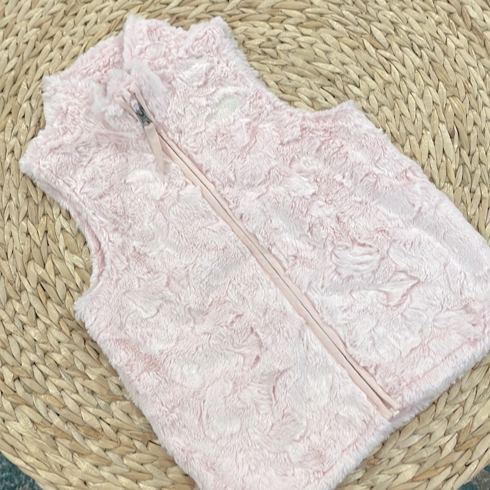 North face fuzzy vest pink